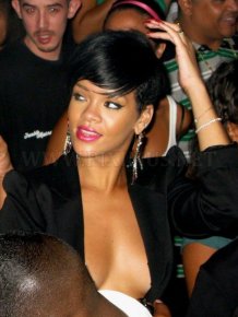 Rihanna lit up in a frank costume