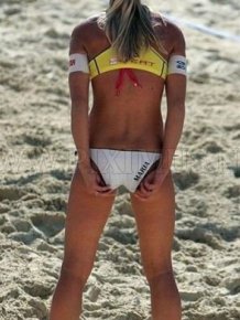 Girls Playing Beach Volleyball in Bikinis
