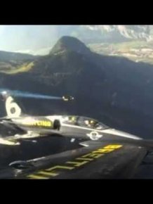 Jet Man Flies With jet pack Over Swiss Alps