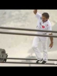 Stuntman's tightrope walk to the top of a mountain