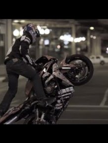 Stunt Motorcyclist in Downtown Chicago - Red Bull Night Tracks