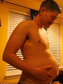 The First Ever Pregnant Guy Gives Birth to a Child  
