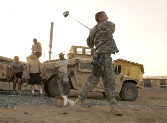 American soldiers play golf during war