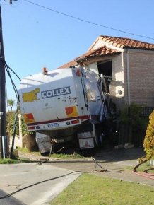 Garbage Truck Trashes House in Australia