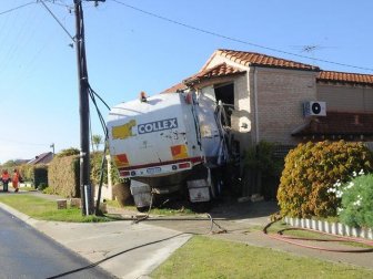 Garbage Truck Trashes House in Australia