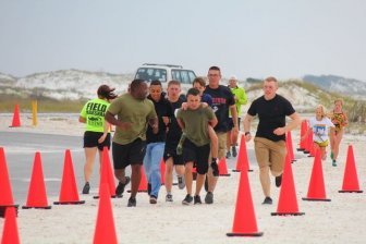 Marines Help Boy With Prosthetic Leg Finish Race