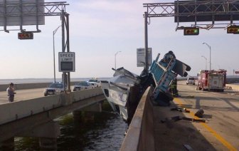 Truck Driver Rescued From Overturned Tractor-Trailer