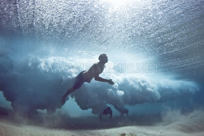 Divers Beneath the Waves 