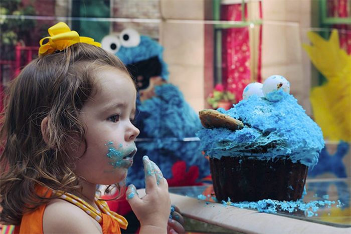 Girl Eats Her Cookie Monster Cake