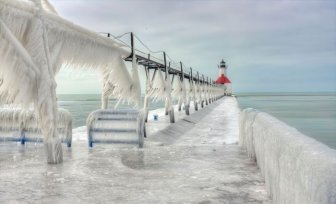 Frozen Lighthouses on Lake Michigan Shore