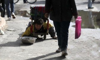 Chinese Beggar Busted 
