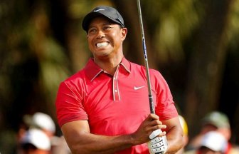 Tiger Woods Hits Fan in Head