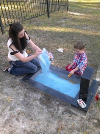 A Grave with a Sandbox