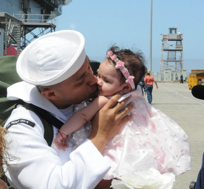 Soldiers Return Home To Meet Their Children