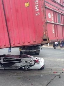 Car Gets Squashed By A Container Truck