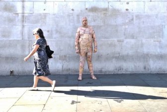 Man Walks Around Town In Chicken Skin Suit