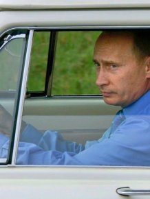 Russian president Vladimir Putin with cars