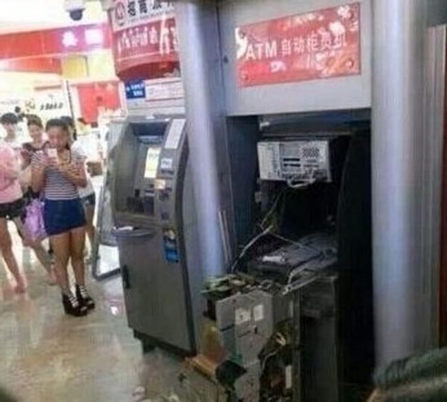Woman Breaks ATM