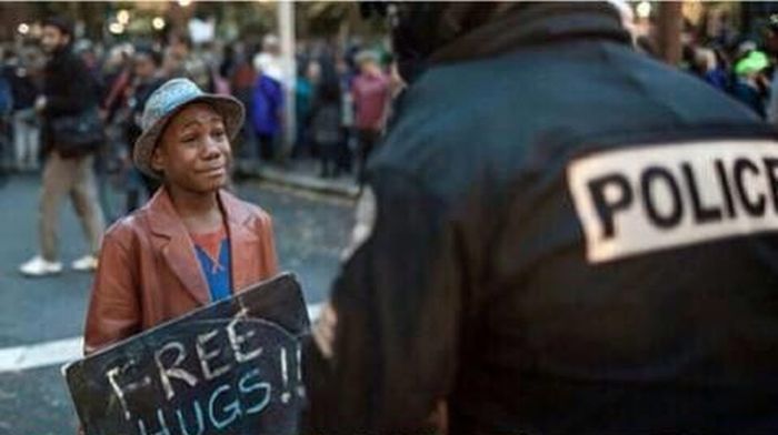 Black Boy Gives Away A Free Hug To A White Cop