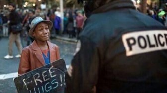 Black Boy Gives Away A Free Hug To A White Cop