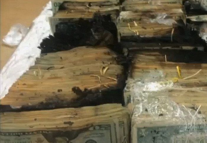 Truck Driver Discovers Massive Amounts Of Money On Fire