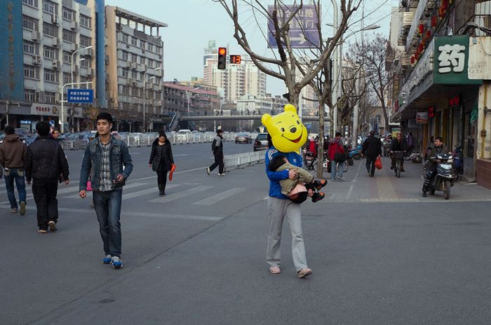 Chinese Street Photographer Captures Perfectly Timed Photos