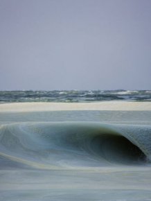Photographer Captures Incredible Frozen Ocean Waves Off The Coast