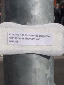 Woman Posts Period Pads With Feminist Messages All Over Her City