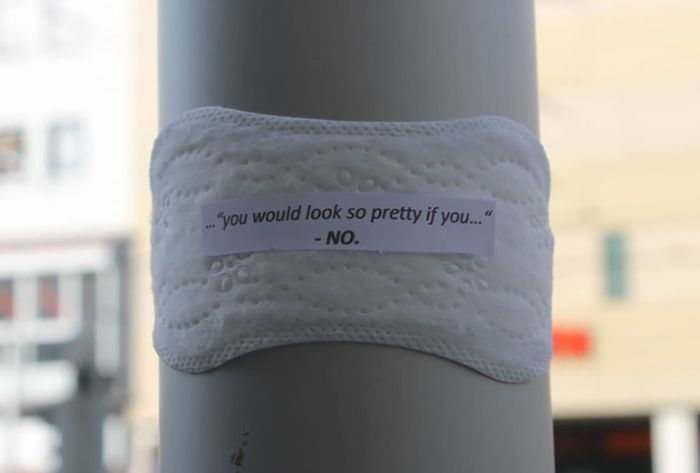 Woman Posts Period Pads With Feminist Messages All Over Her City