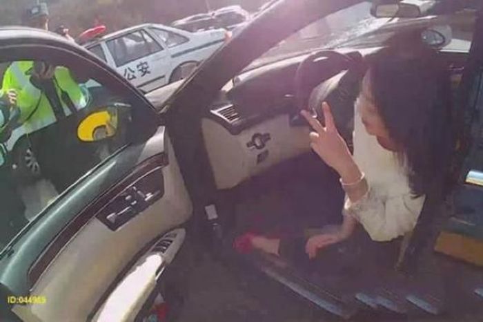 Premium Photo | A young woman takes a selfie with her husband who holds the  car key a young couple bought a new car at a dealership outside