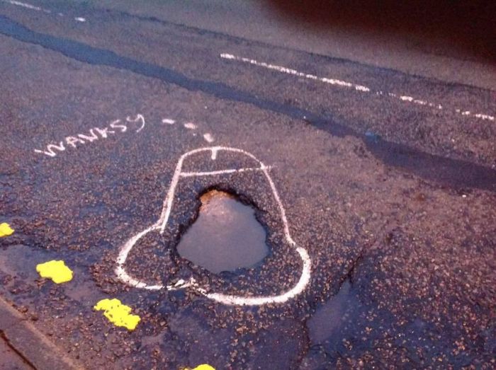 Artist Uses Penises To Draw Attention To Potholes In England