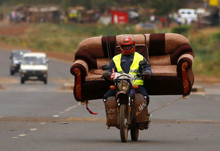 These People Prove That Anything Can Be Transported On A Motorcycle