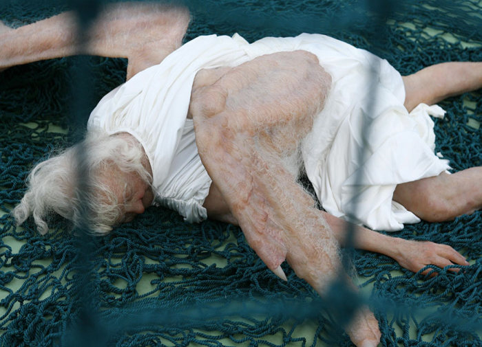 This Realistic Sculpture Of A Fallen Angel Is Absolutely Terrifying