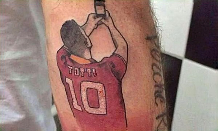 Football Fans Show Their Love Of The Game With Tattoos