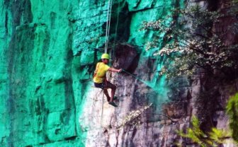 Man Hires Workers In China To Paint A 900 Foot Cliff Green
