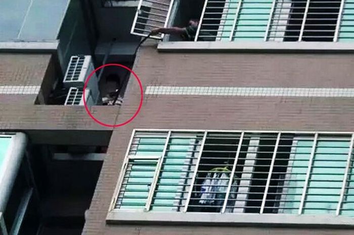 Man Stands On Ledge For 7 Hours When His Lover's Husband Comes Home Early