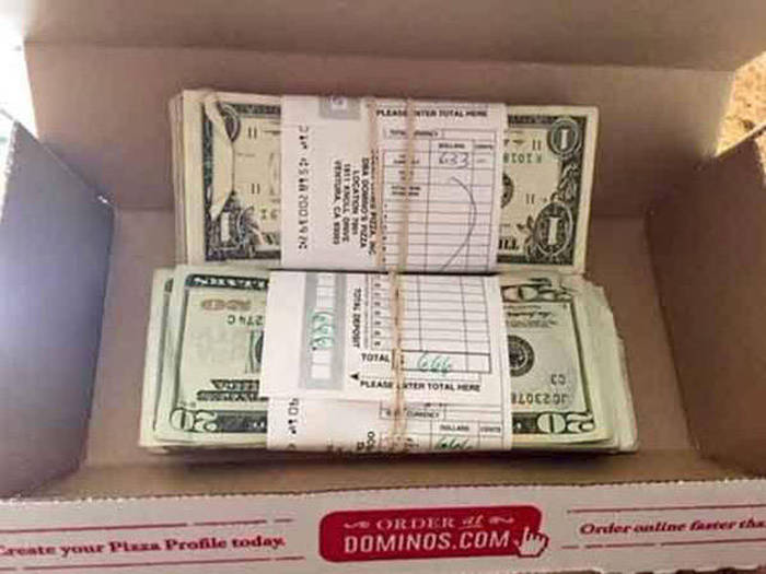 Domino’s Driver Accidentally Delivers A Stack Of Cash To A Customer's Door