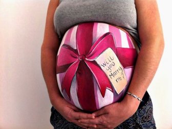 Dad Proposes To Pregnant Wife By Painting Her Baby Bump