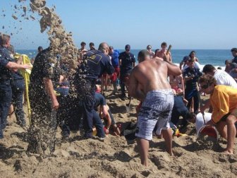 Teen Survives 30 Minutes Buried in Sand 