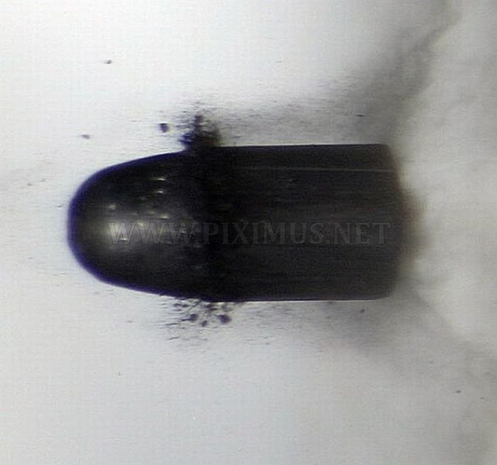 High-Speed Photographs of Bullets