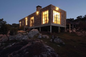 A modern house made from boulders