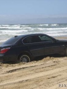 Car stuck on beach