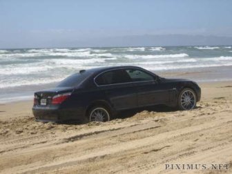 Car stuck on beach