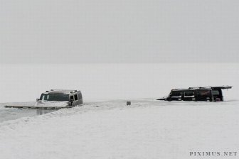 Two Hummers Got Stuck in Frozen Lake