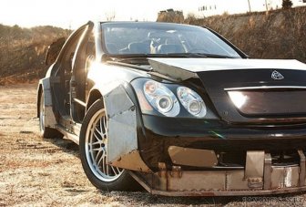 Kanye West and Jay-Z destroy a Maybach and then auction it off 