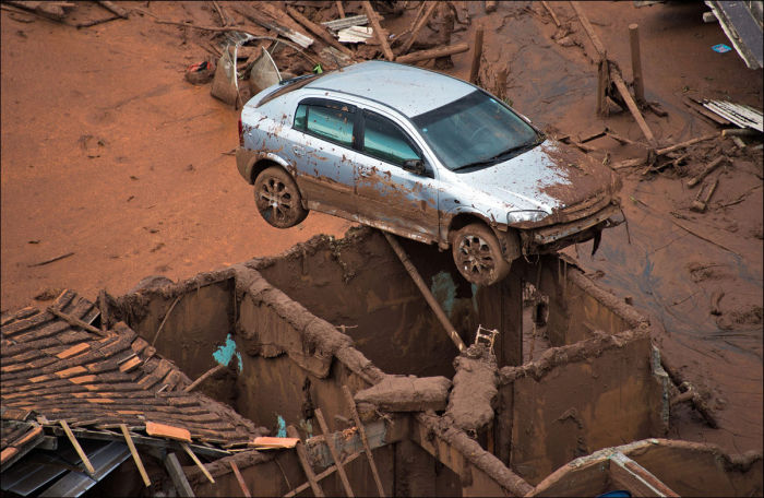 Red Mud Flows Through The Streets Of Brazil