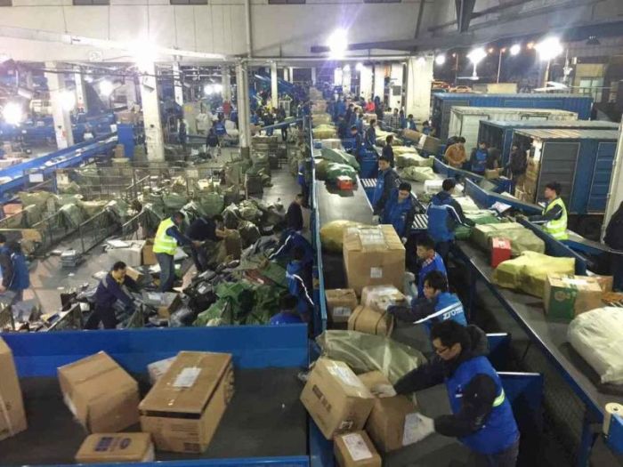 Chinese Mail Workers Get Swamped On This Day Of The Year