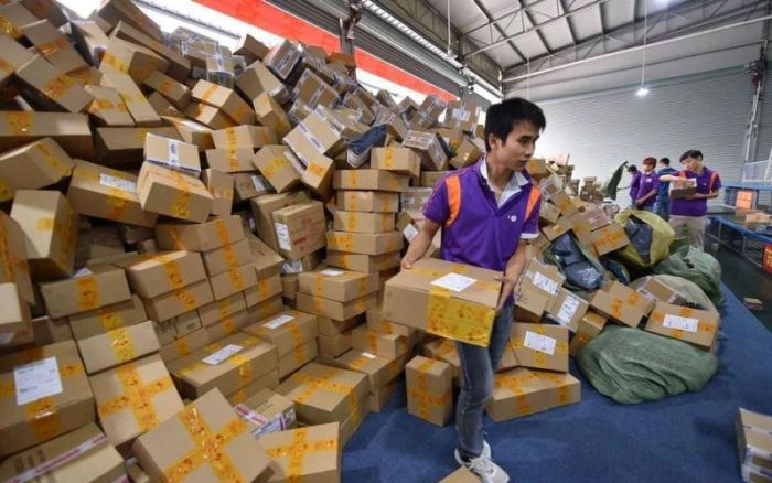 Chinese Mail Workers Get Swamped On This Day Of The Year