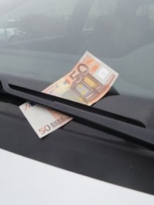 Why You Shouldn't Grab That $100 Bill On Your Windshield