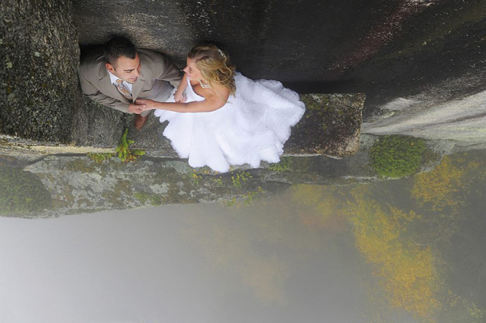 Couple Takes Extreme Wedding Photos On The Edge Of A Cliff